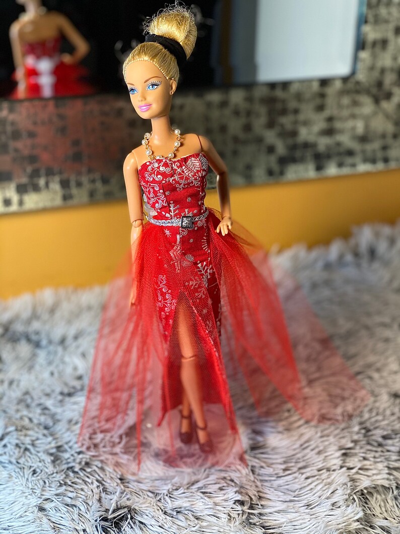 doll with red dress