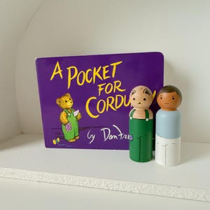 Montessori Book | A pocket for corduroy peg doll set | tactile learning | reading fun | peg dolls | educational gift | wooden toys