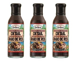May include: Three glass bottles of Grace Authentic Oxtail Marinade. Each bottle is labeled with the brand name, product name, and ingredients in English and Spanish. The bottles are 11.8 fluid ounces each.