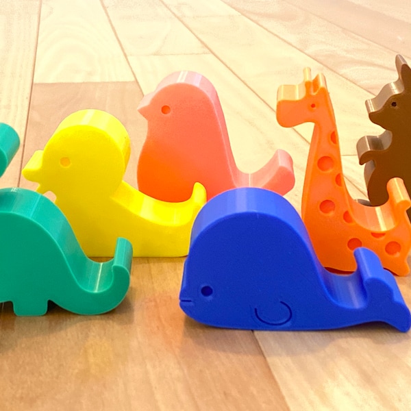 Lindos soportes de teléfonos para animales (jirafa, ballena, pájaro, dinosaurio, canguro, pato)