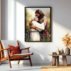 May include: A framed print depicts a tender embrace between two figures, one with long hair and a robe, the other in a white dress. The artwork is set against a backdrop of soft, blurred greenery and flowers, with a warm, inviting light.