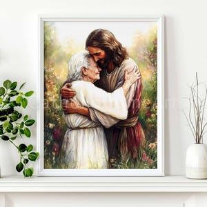 May include: A framed print depicts a tender embrace between two figures. One figure, with long brown hair and a maroon robe, embraces an elderly person in a white garment. The background features a lush garden with colorful flowers, creating a serene and comforting scene.