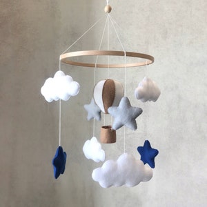 Baby boy nursery mobile hot air balloon stars and clouds. Navy blue and gray decor baby room. Neutral mobile crib