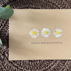Karte / getrocknete Gänseblümchen/ Geburtstagskarte / Geschenkkarte / floral / Blumen / Grusskarte