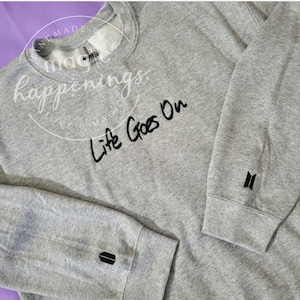 Life Goes On besticktes Sweatshirt