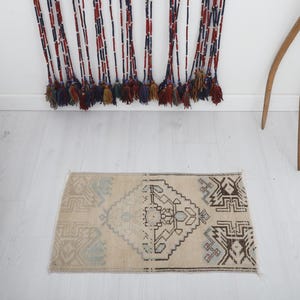 Vintage Turkish Mini Rug: Oushak Wool Accent Rug (2.3x1.4 ft)