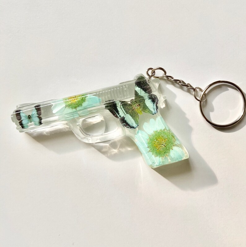 Resin Gun With Butterflies resin decoration