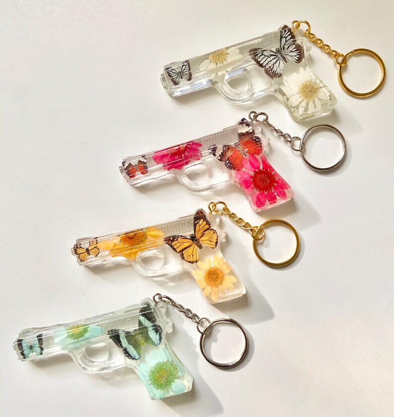 Resin Gun With Butterflies resin decoration