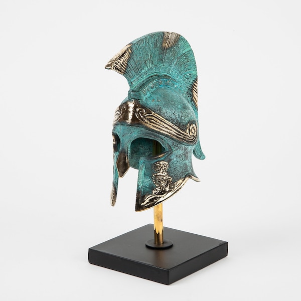 Aged and brushed bronze sculpture of a Greek soldier's helmet on a stand - hand made premium metal bronze sculpture