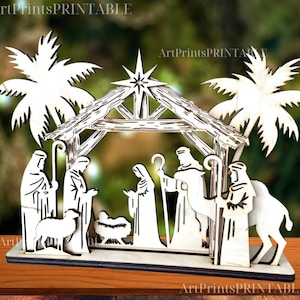 May include: A wooden nativity scene featuring a stable, palm trees, and figures of Mary, Joseph, the baby Jesus, and the three wise men. The scene is cut from light-colored wood and stands on a wooden base.