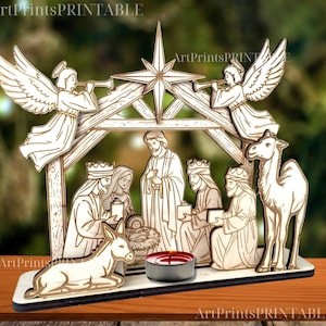 May include: Wooden nativity scene with angels, star, and figures of the Holy Family and the Three Wise Men. A candle holder is in the center. The text "ArtPrintsPRINTABLE" is at the top and bottom.