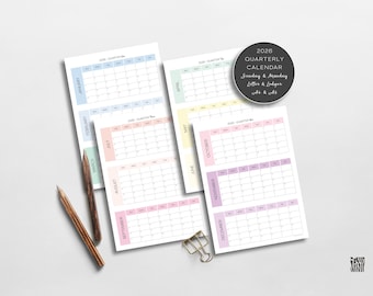 May include: 2026 quarterly calendar with pastel color-coded months. The calendar includes Sunday and Monday start dates. Two pencils and a gold paper clip are next to the calendars. The calendar is labeled "Letter & Ledger As & As".