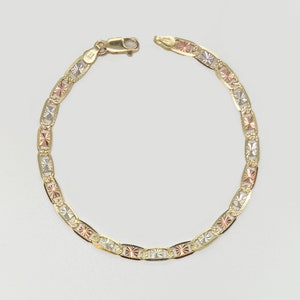 Stunning 10k & 14k solid gold tri-colored Valentino link bracelet anklet for women and girls. Features tri-colored gold for a versatile, elegant look. Adds a touch of sophistication to any outfit.