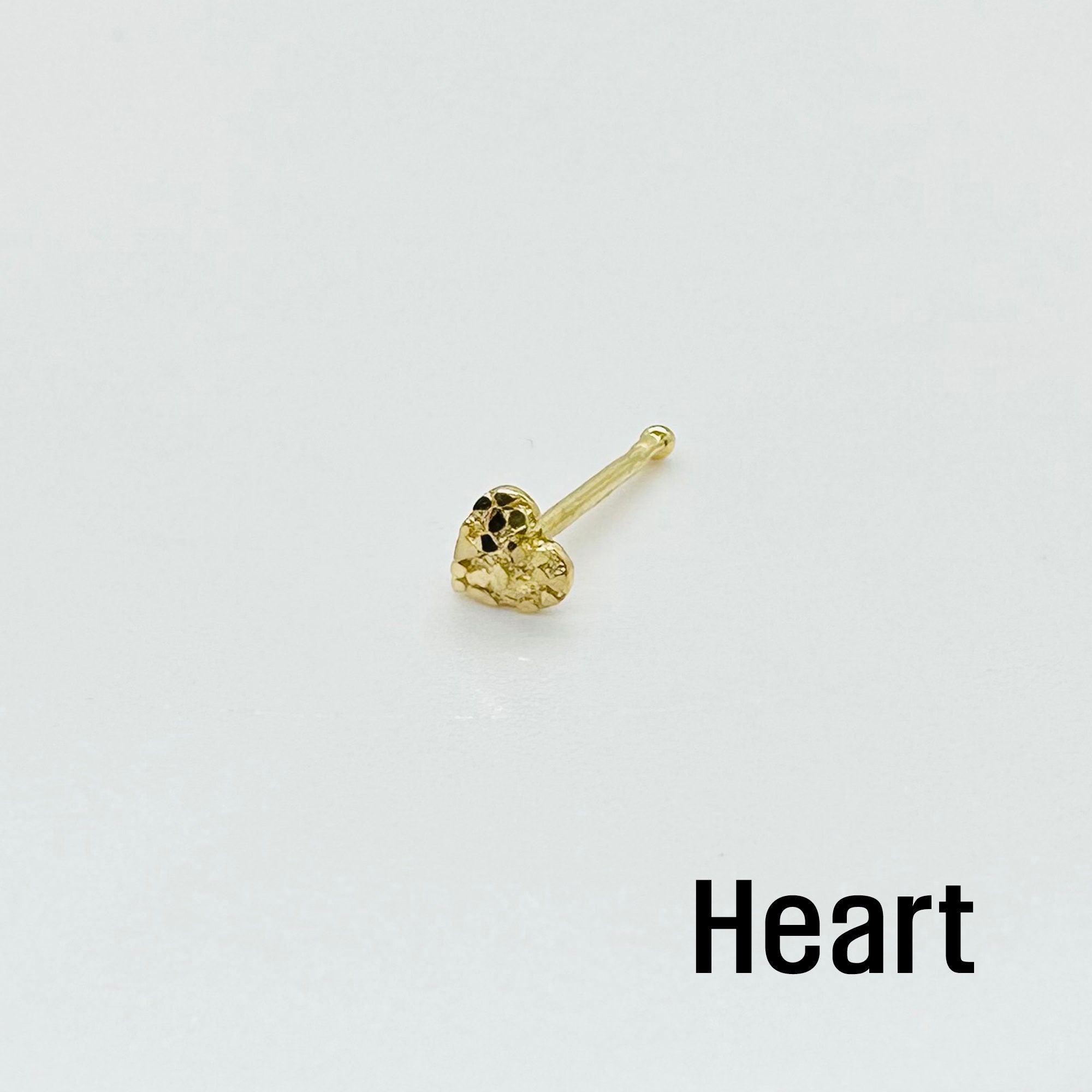Gold nugget nose on sale piercing