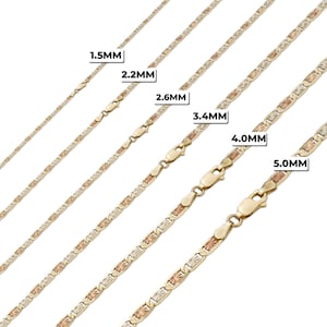 May include: A set of six gold chains with different widths, ranging from 1.5mm to 5.0mm. The chains are made of three-tone gold, with yellow, white, and rose gold sections.