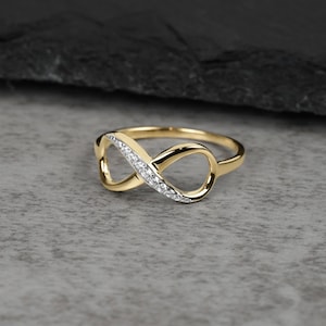 Anillo Meir Infinity de oro de 10k y 14k con circonitas cúbicas