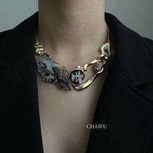 Gold statement bib necklace. Matte gold necklace. Bib image 1