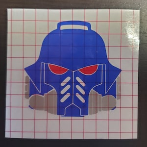 May include: A blue helmet with a white visor and red eyes. The helmet is on a white grid background.