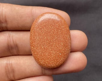 Cabochon ovale di pietra del sole arancione: pietra preziosa naturale per la creazione di gioielli