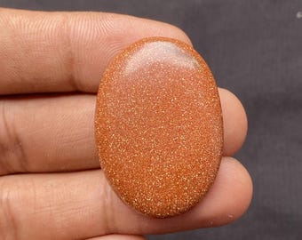 Cabochon ovale di pietra del sole: pietra preziosa arancione naturale per la creazione di gioielli