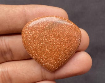 Cabochon ovale di pietra del sole: pietra preziosa arancione naturale per la creazione di gioielli