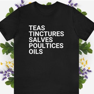 HERBALIST Tee Shirt | TEAS TINCTURES Salves Poultices Oils Short Sleeve Tee | Witchy Plants Herbology Cottage Core List