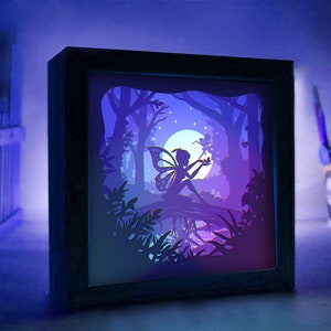 Boîte d'ombre de fée lune, boîte d'ombre de papier découpé SVG Lightbox, carte Shadowbox Cricut, fichiers Silhouette, fichier numérique, ailes de fée