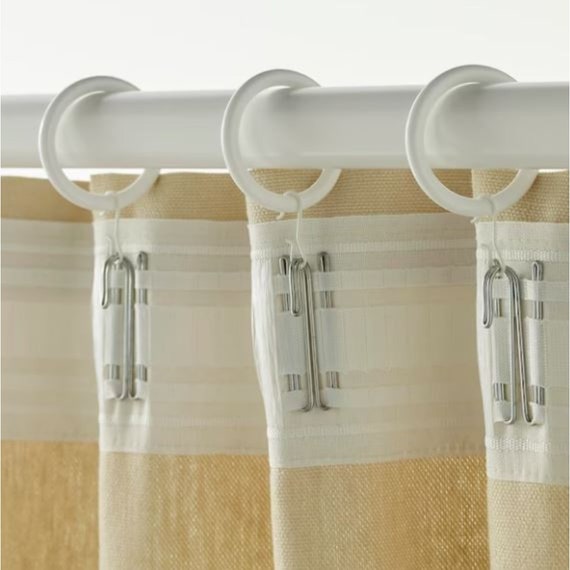 Set di 50 ganci in metallo per appendere tende, luci decorative e altri oggetti per la casa. | Leroy Merlin