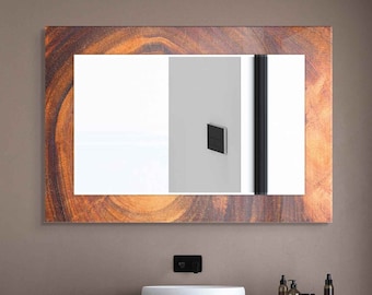 May include: A modern bathroom vanity with a gray and white countertop, two drawers, and a white porcelain sink. The vanity is mounted on the wall and has a decorative wood-framed mirror above it.