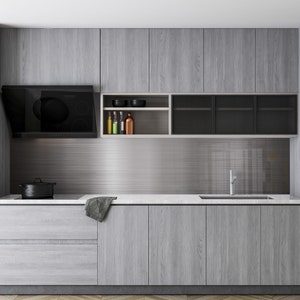 May include: A modern kitchen with grey cabinets, a stainless steel splashback, and a black range hood. The countertop is white and there is a sink with a chrome tap.