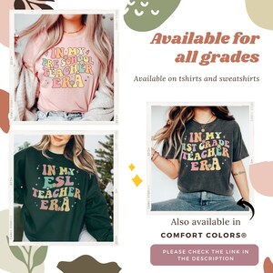 以下が含まれることがあります： レトロなフォントで「In My [Grade] Teacher Era」と書かれたTシャツの画像が3枚。Tシャツは黒、ピンク、グレーで販売されています。テキストは虹色のカラーリングです。画像の上には「全学年対応」と「Tシャツとスウェットシャツで販売」というテキストが表示されています。画像の下には「COMFORT COLORS&reg;でも販売」と「説明欄のリンクを確認してください」というテキストが表示されています。