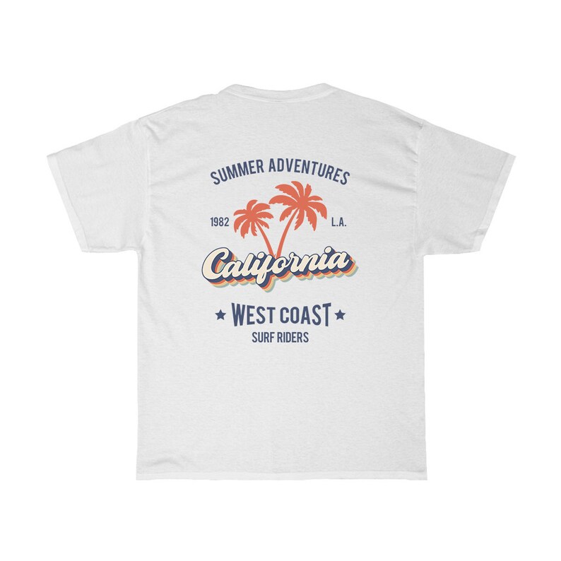 May include: White t-shirt with a retro-style graphic design featuring palm trees and the text "Summer Adventures 1982 California L.A. West Coast Surf Riders".