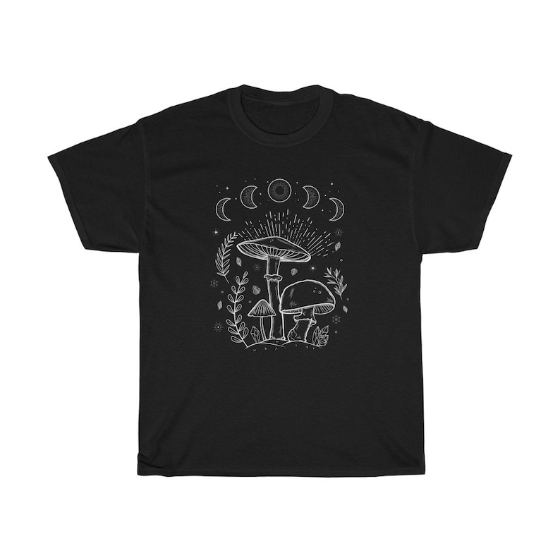 May include: Black t-shirt featuring a white outline of mushrooms and a crescent moon design.