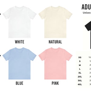 May include: Adult unisex t-shirts in black, white, natural, navy, blue, and pink. The shirts are available in sizes XS, S, M, L, XL, 2XL, 3XL, and 4XL. The size chart shows the width and length of each size in inches and centimeters.
