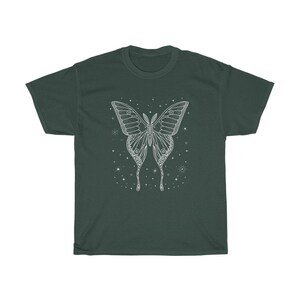 May include: A dark green t-shirt with a white outline of a butterfly with a starry background.