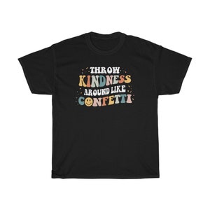 May include: Black t-shirt with the text "Throw Kindness Around Like Confetti" in colourful retro font with a smiley face.