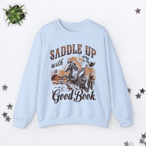 Saddle Up With A Good Book Cowgirl Sweatshirt Bookish Sweatshirt Cowboy Romance Midwest Sweatshirt Book Club Sweatshirt Smut Book Worm Gifts Light Blue