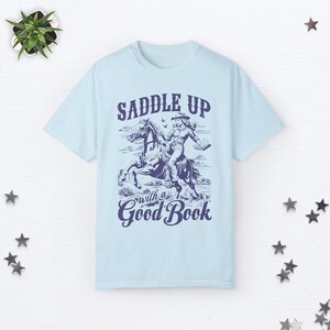 Bookish Cowgirl Shirt Cowboy Romance Shirt Howdy Shirt Yeehaw Shirt Smut Book Lover Gift Romance Reader Shirt Vintage Western Graphic Tee Chambray