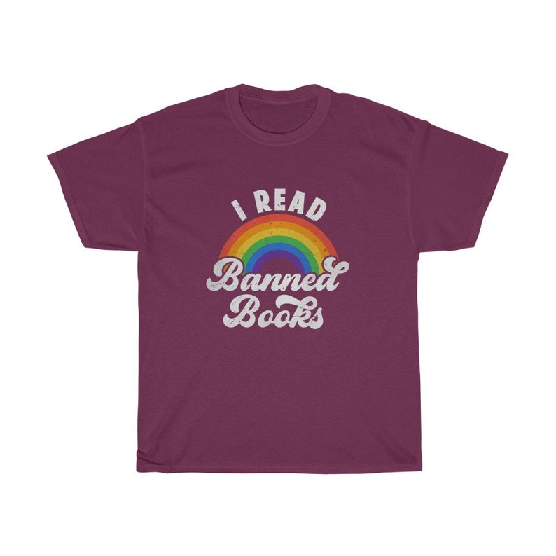 May include: A maroon t-shirt with a rainbow and the text "I Read Banned Books" in white.