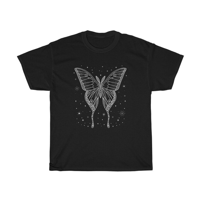 May include: Black t-shirt with a white outline of a butterfly with stars around it.