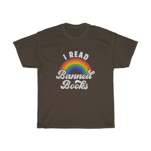 May include: A brown t-shirt with a rainbow and the text "I Read Banned Books" in white.