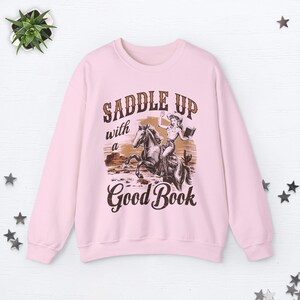 Saddle Up With A Good Book Cowgirl Sweatshirt Bookish Sweatshirt Cowboy Romance Midwest Sweatshirt Book Club Sweatshirt Smut Book Worm Gifts Light Pink