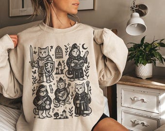 Sweat chat médiéval Sweat-shirt Castlecore livre Nerd ras du cou chat chevalier pull cadeaux pour amoureux des chats Renaissance Fair Whimsigoth vêtements
