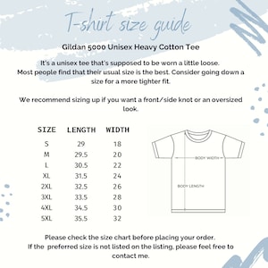 May include: A size chart for Gildan 5000 Unisex Heavy Cotton Tee shirts. The chart shows the size, length in inches, and width in inches for sizes S through 5XL. The chart also includes a diagram of a t-shirt with the body length and body width labeled.