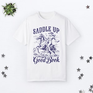 Bookish Cowgirl Shirt Cowboy Romance Shirt Howdy Shirt Yeehaw Shirt Smut Book Lover Gift Romance Reader Shirt Vintage Western Graphic Tee White