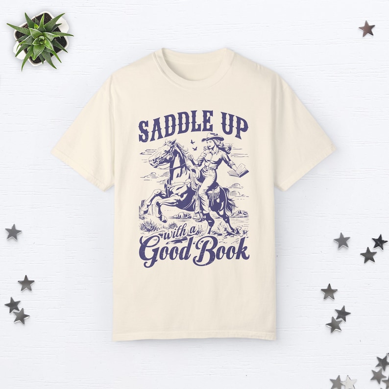 Bookish Cowgirl Shirt Cowboy Romance Shirt Howdy Shirt Yeehaw Shirt Smut Book Lover Gift Romance Reader Shirt Vintage Western Graphic Tee Ivory