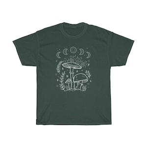 May include: A dark green t-shirt featuring a white outline of mushrooms and a crescent moon design.