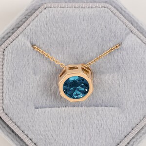 Blue Topaz Gold Pendant