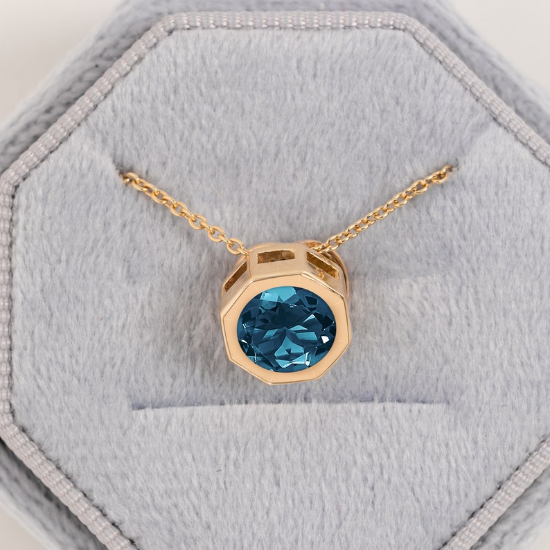 Blue Topaz Gold Pendant