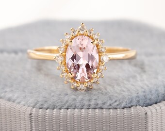 Anel de noivado em ouro 14k com morganita oval, halo de diamantes e estilo Art Déco.